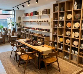 The tea gallery venue with a long wooden table